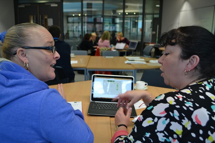 FractionsLab disussion Two teachers discussing FractionsLab at a Mathematics Specialist Teachers workshop